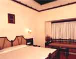 Kerala Room,The Woods Manor-A heavenly stop-over,Business-Class hotels,India,Kerala,Kochi,3 star hotels,tour packages,Ayurveda,Conference facilities,Leisure Facilities,Kerala Tour  packages, Kerala Holidays, South India Tour Packages and  sight seeing.